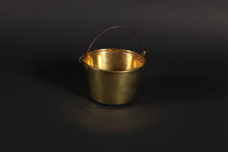 A brass pot.