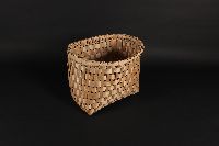 A medium size basket woven from ash bark.