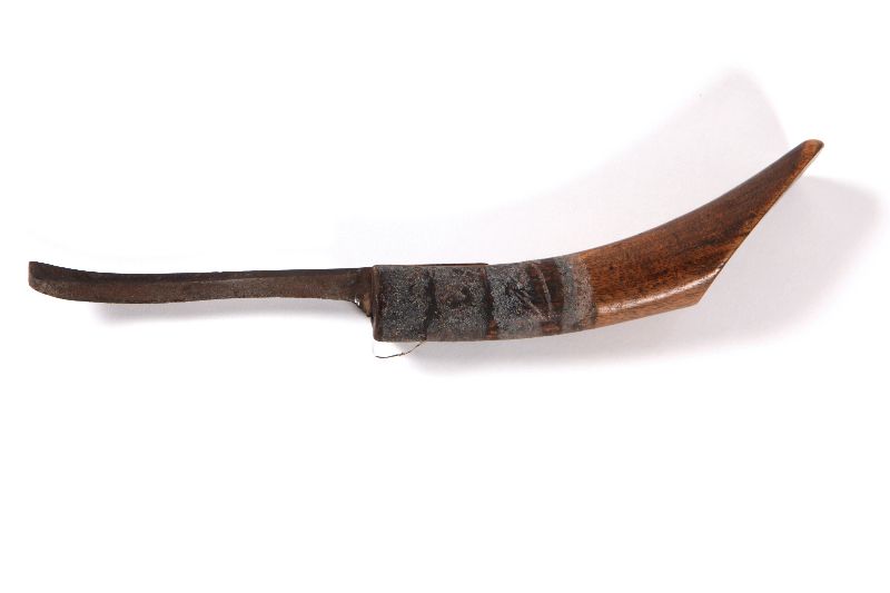 A curved metal blade set in a wooden handle.